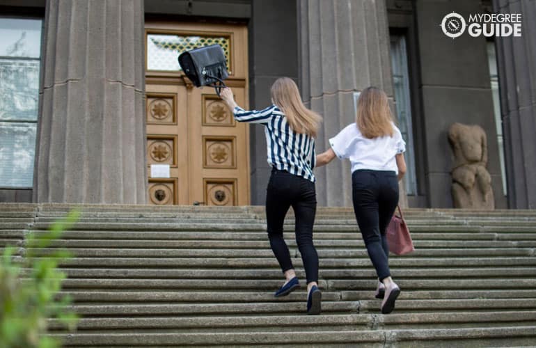 project management students entering a college building