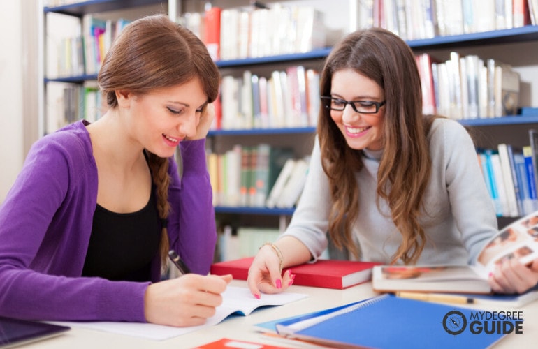 college students studying together in library