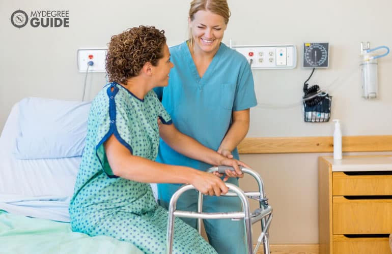 happy nurse assisting a female patient