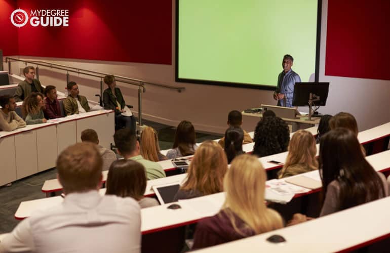 students listening to a lecture in a university