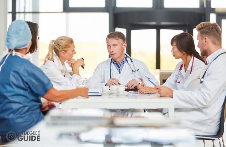 health administrators in a meeting