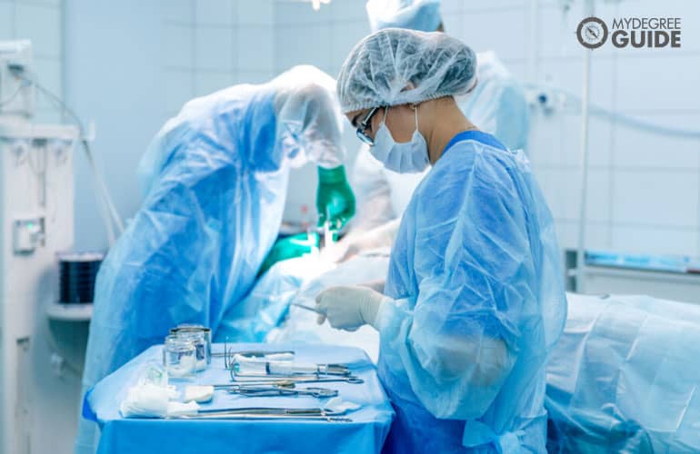 surgical assistant assisting during a medical operation