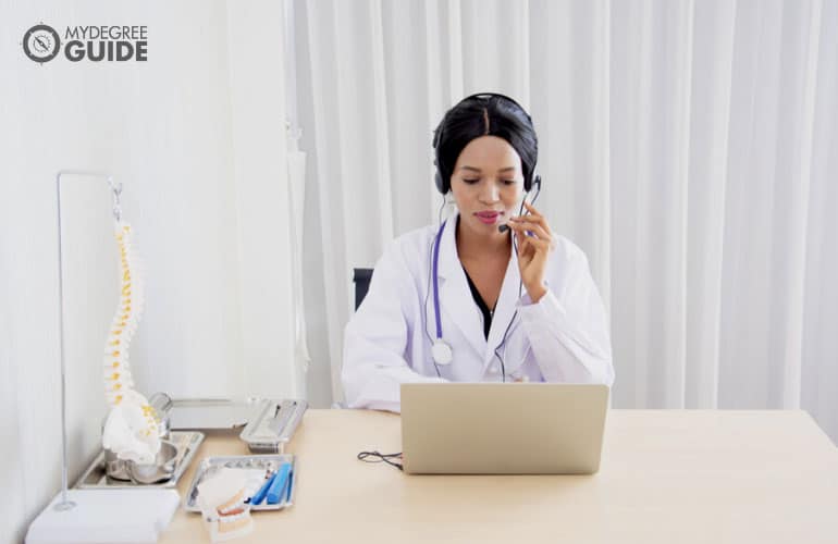 doctor talking to fellow doctors online