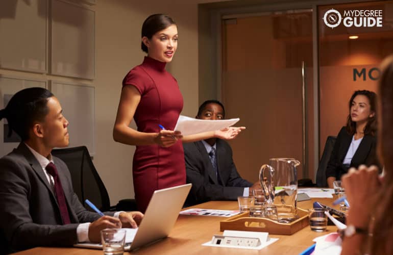 female manager presenting documents during a meeting