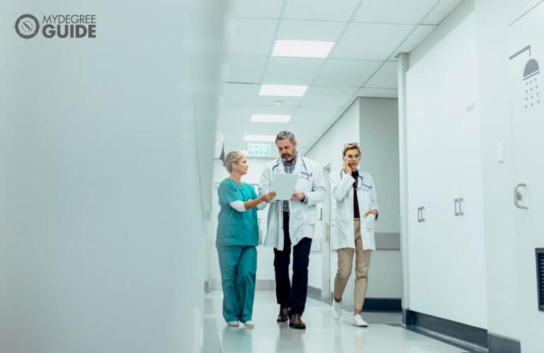 medical staff walking on hospital's hallway