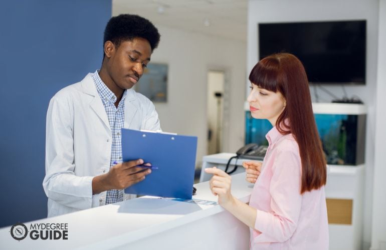 Medical Administrative Assistant answering patient's questions