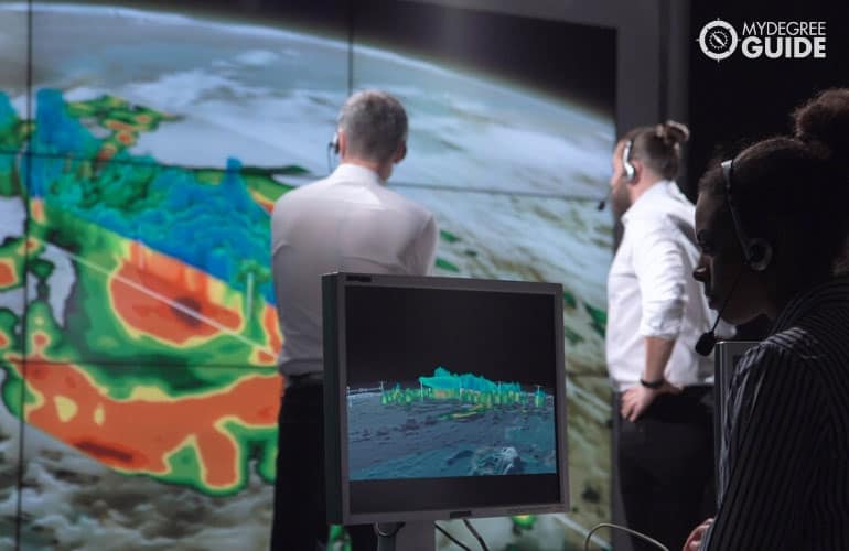 Meteorologists monitoring a hurricane 