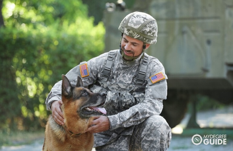 US military with his dog