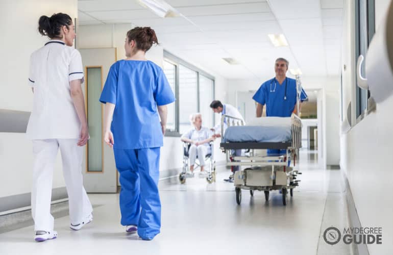 nurses walking on hospital hallway