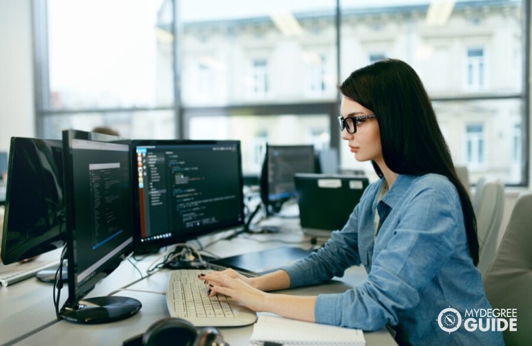 female computer programmer working in an office