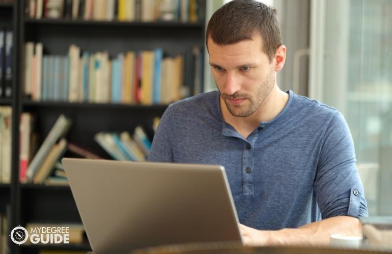 Man pursuing his Masters Degree in Organizational Management Online