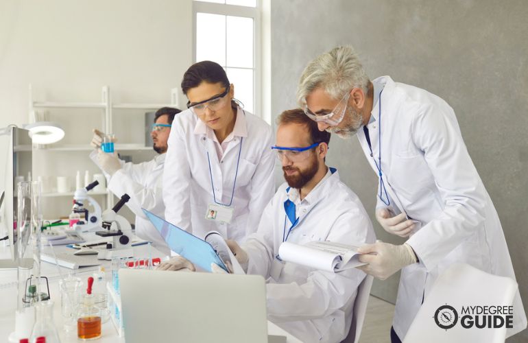 pharmaceutical researchers working in a lab