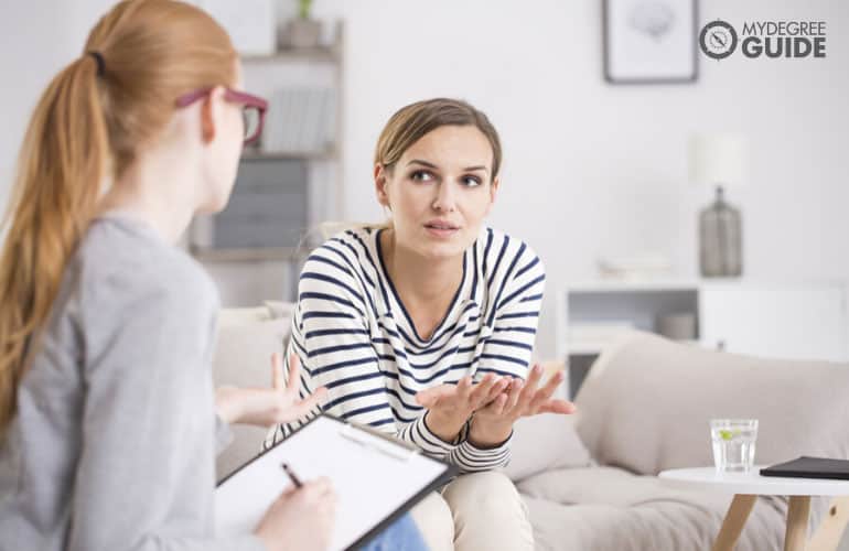 psychologist talking to a patient in her office