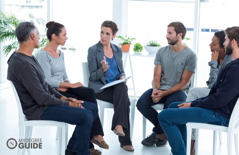 psychologist having a group therapy session